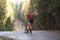 Women ride roller skis in the autumn Park