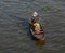 Women rowing boat on Mekong river in Mekong Delta, Vietnam