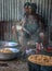 Women of rural Haiti cook large pots of rice and beans for school children.