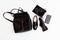 Women`s backpack, shoes, phone and headphones in black. Women`s leather fashion accessories.  Flat lay, top view. Spring fashion c