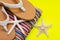 Women`s Causal Braided natural color Beach Flip Flops and Colorful Striped Beach Towels decorated with White Finger Starfish