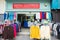 Women`s clothing at outdoor market. clothes on display