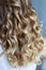 Women`s curls in a professional wedding hairstyle