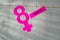 Women`s Day Concept. The symbol of Venus. Pined on the clothespins paper figure eight and the word Mart