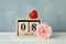 Women`s day March 8 with wooden block calendar and heart. Happy mothers day. Spring flower