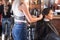 Women`s hair salon. Beautiful brunette woman in Spa salon. Keratin restoration, latest trend, fresh idea, haircut picking, shorte