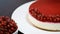 Women`s hand decorated cheesecake red currant