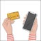 Women`s hands with a credit card and smartphone pay for purchases online. Credit card payment.