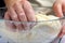 Women& x27;s hands knead the yeast dough. Baking dough preparation process. Kneading dough for baking bread.
