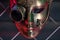 Women\\\'s iron steampunk mask. Halloween or masquerade mask. Background from iron bars and multi-colored illumination.