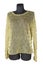 Women`s knitted pullover of gold color, well visible weaving of thread.