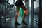 Women\\\'s leg and knee pain after a workout at the gym. Treatment of joints and leg injuries. AI Generation