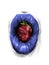 Women`s lips in the shape of a round tube inside berry strawberry