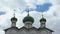 Women\'s Orthodox monastery with dark green domes