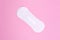 Women`s daily panty liner on a pink background