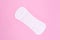 Women`s daily panty liner on a pink background. Intimate hygiene product