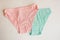 Women`s underwear. multicolored underpants on a light background. a piece of clothing for a person.