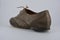 Women`s unusual gray brown shoes, shoes from genuine leather in the English style.