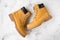 Women`s winter boots. Yellow warm boots for trekking