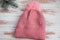 Women`s winter warm knitted hat with a pompom.