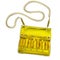 Women`s yellow handbag with a long chain handle