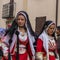 Women in Sardinian costume ride in Oristano during the festival