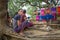 Women selling colorful fabrics