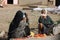 Women selling vegetables on street market