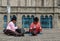 Women sewing, andean costume, knitting