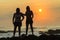 Women Silhoueted Sunrise Ocean