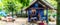 Women sitting on porch of small cottage