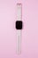 A women smart watch on pink background