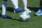 Women soccer players preparing for match on a soccer field. Nike, Select, Adidas