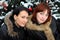 Women stands near green tree