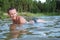 Women swimming lake summer