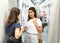 Women talking in subway car