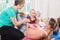 Women and their babies in mother-child gymnastic course