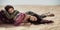 Women thirsty laying in a desert. Lost in desert durind sandshtorm