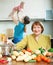 Women of three generations in domestic kitchen