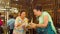 Women Tourists Tasting Freshly Made Cocoa Paste