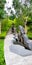 Women tourists are walking up staircase and seeing nature plant in the garden by the bay at Singapore, Singapore