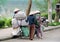 Women in traditional Asian conical hat