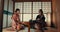 Women in traditional Japanese tea house, kimono and relax with conversation, respect and service. Friends at calm