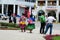 Women in traditional peruvian clothes and hats on the streets of Cuzco city