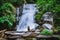 Women travel. woman asia travelers travel nature Forests, mountains, waterfalls. Travel Siliphum Waterfall at Chiangmai, in