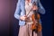 Women violinist with a violin and bow in hands
