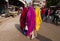 Women walking wearing colourful sarees