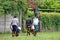 Women by a wall in Harare