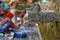 Women washing clothes at the fountain of Bandipur village on Nepal