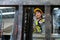 Women wear safety helmet happy smiling looking at camera driver forklift warehouse in factory. Female worker industrial operate.